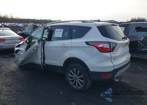 2018 Ford Escape Titanium z USA, uszkodzony, nr VIN 1FMCU9J99JUC64259